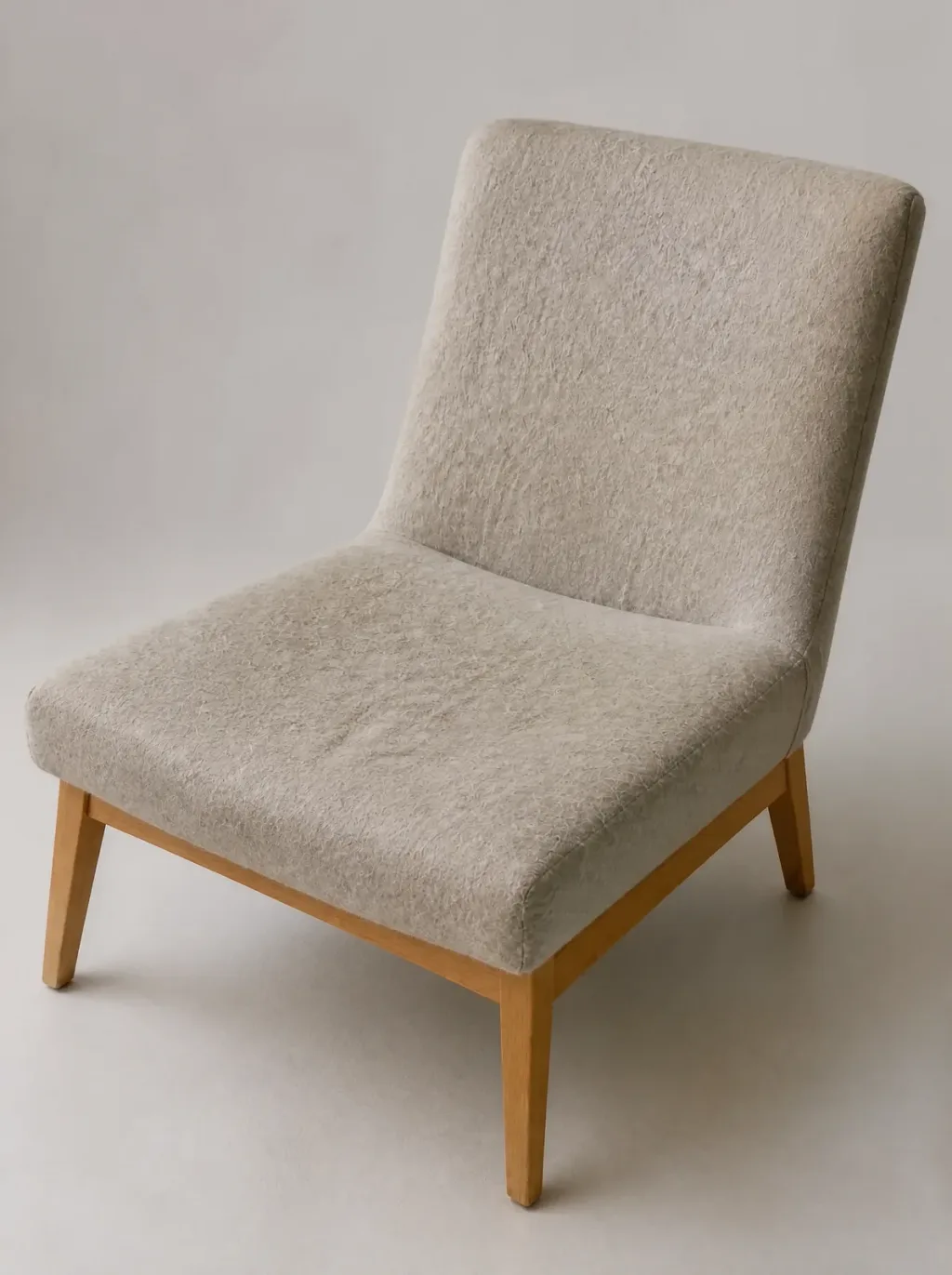Druckstelle auf der rechten Armlehne, der Wollstoff selbst unversehrt | Knoll Womb Chair Polsterreparatur Knoll Womb Chair Möbel reparieren: Druckstelle auf der rechten Armlehne, der Wollstoff selbst unversehrt