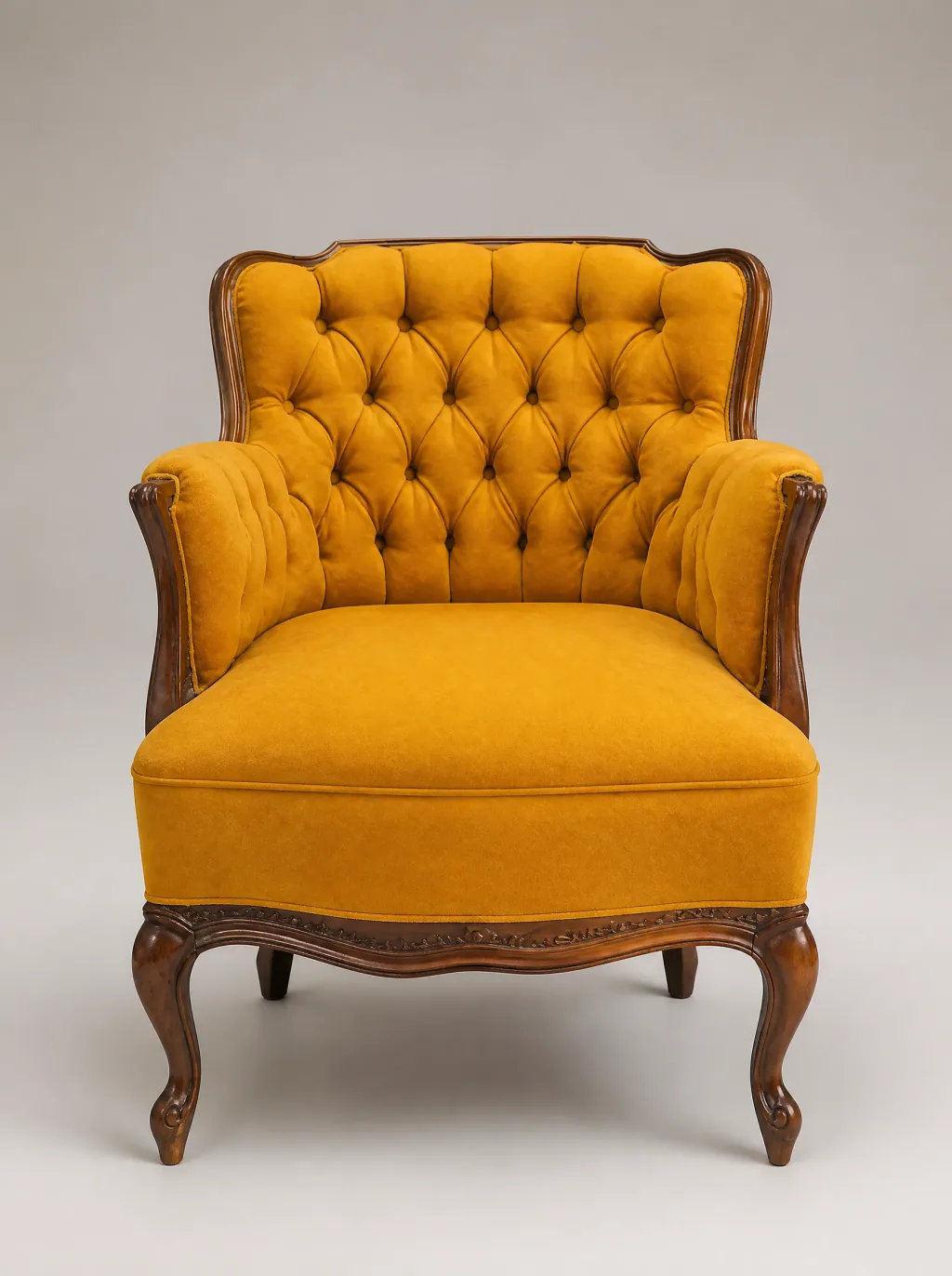 Chesterfield-Sessel in Senfgelb mit Knopfheftung | Chesterfield Chesterfield-Sessel in Senfgelb mit Knopfheftung: Polsterwerkstatt Wetzikon bei der Egora Polsterei in Wetzikon